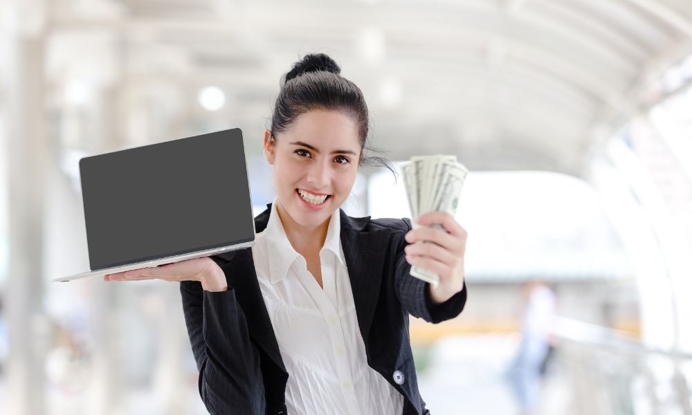 business woman holding money